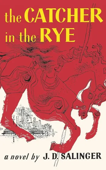 a red and yellow cover of a book - The Catcher in The Rye